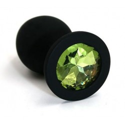 Чёрная силиконовая анальная пробка с светло-зеленым кристаллом - 7 см.